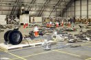 Columbia debris, including landing gear tires, in the RLV Hangar at KSC. NASA photo.