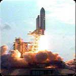 In this colorful NASA image, Space Shuttle Endeavour launches from Kennedy Space Center, Fla., to begin STS-111.